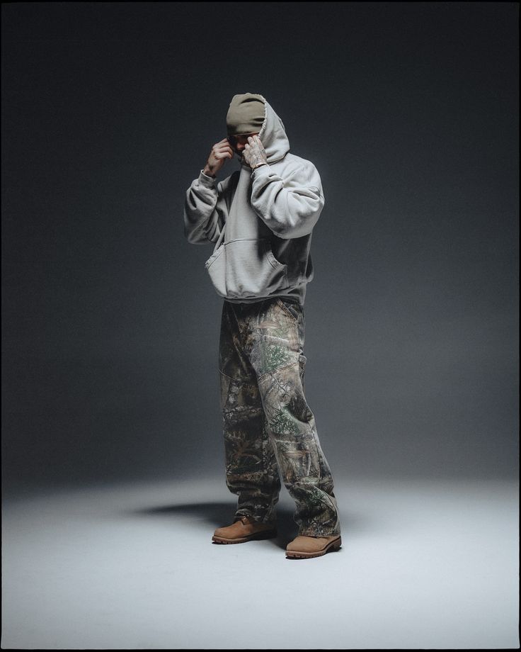 NOIR Hoodie in a dark studio product look